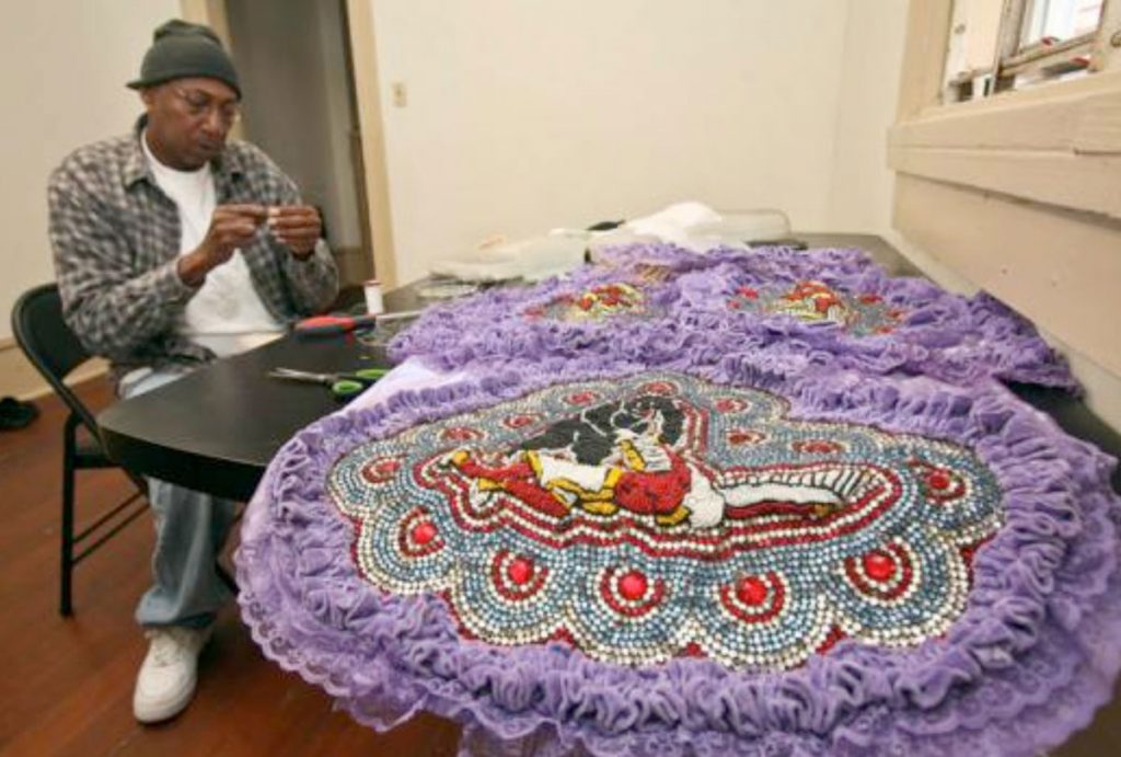 Big Chief Howard Miller of the Creole Wild West Mardi Gras Indians makes patches for his suit. Photo: Zada Johnson