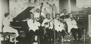 Papa Celestin's Original Tuxedo Orchestra; Jeanette Kimball, Joseph Thomas ('Brother Cornbread or 'Empty Mouth'), Sidney 'Jim Little' Brown, Albert French, Albert 'Fernandez' Walters, Louis Barbarin, Wendell Eugene. Dan's Pier 600, New Orleans, LA. circa 1959; Courtesy of Hogan Jazz Archive, Tulane University