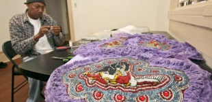 Big Chief Howard Miller of the Creole Wild West Mardi Gras Indians makes patches for his suit. Photo: Zada Johnson