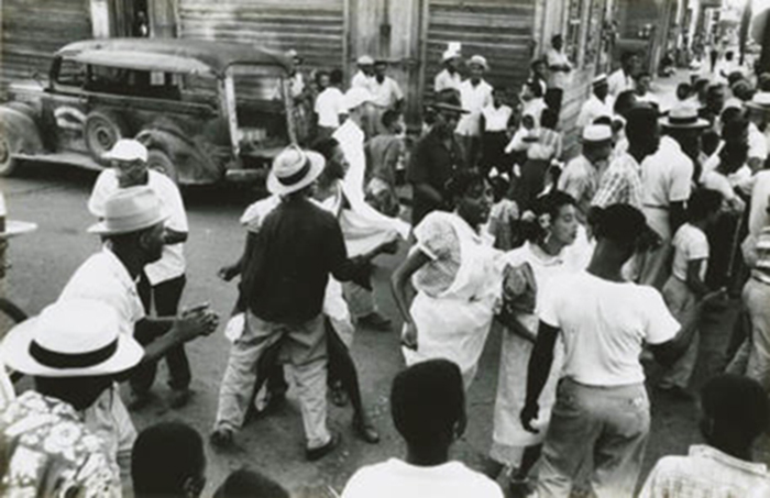 People dancing in the street 1953. Photo Ralston Crawford
